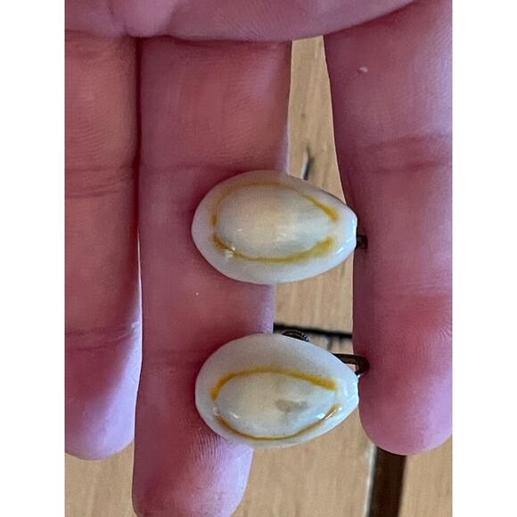 Pair of seashell style clip on earrings. White/brown. Beachy. Nautical. - Picture 2 of 4